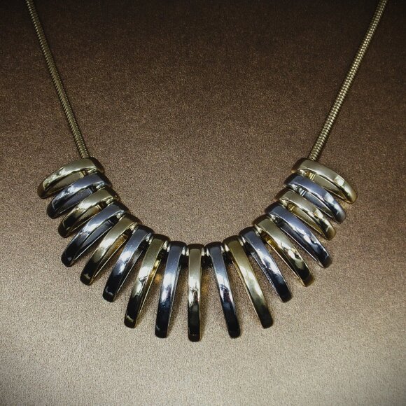 Silver and gold necklace with dome shape metal links attached to a snake chain - Picture 4 of 8